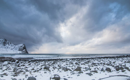 Scenic view of sea against sky during winter