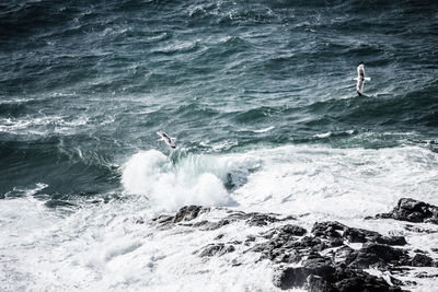 Scenic view of sea waves rushing towards shore