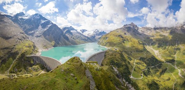 Panoramic view of lake and mountains against sky