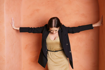 Attractive woman says thank you, but no. beautiful girl in jacket rejecting