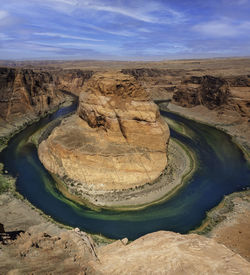 Scenic view of rock formations against sky