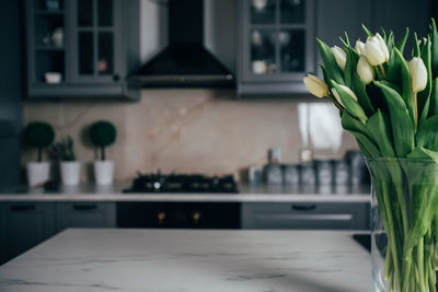 Close-up of vase on table at home