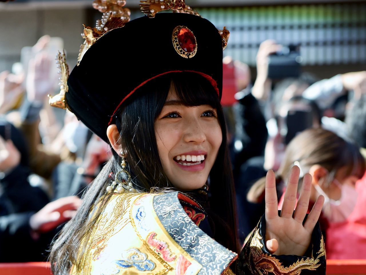 real people, celebration, focus on foreground, headshot, one person, happiness, lifestyles, smiling, portrait, standing, looking at camera, day, young adult, outdoors, young women, close-up, people