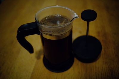 High angle view of coffee served on table