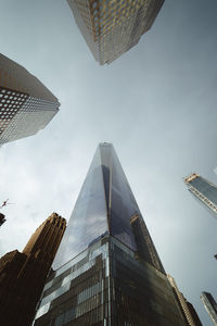 Low angle view of skyscrapers against sky