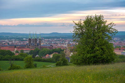 View of city against cloudy sky