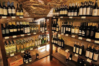 Row of bottles on display at store