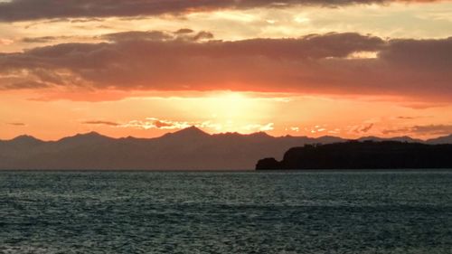 Scenic view of sea against sky during sunset