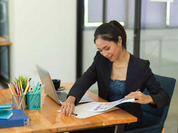 Woman working on table