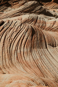 Waves of pattern on petrified red rock sand dunes in southern utah