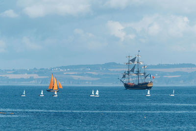 Boats sailing in sea