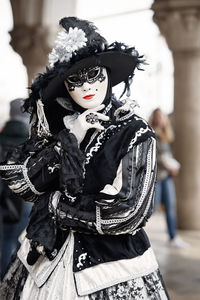 Midsection of woman with mask. venice carnival