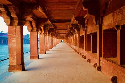 Huge horse stable inside ancient king's palace in india. little hole in the right bottom is to tie. 