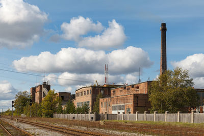 Panoramic view of factory against sky