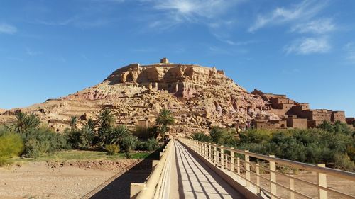 View of castle on mountain against sky