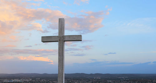 Cross against sky during sunset