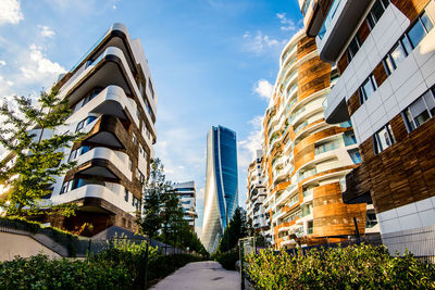 Low angle view of modern buildings against sky