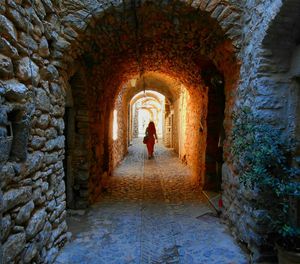 People walking in tunnel