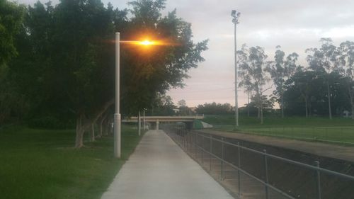 Empty road at sunset