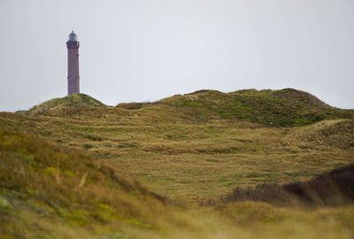 Lighthouse on landscape