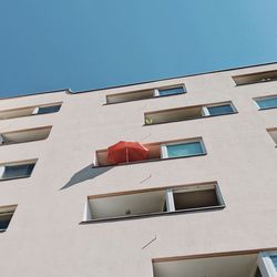 Low angle view of building against blue sky
