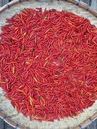 High angle view of red chili peppers for sale in market