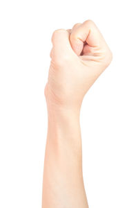 Close-up of human hand over white background