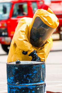 Bomb squads defusing bomb outdoors