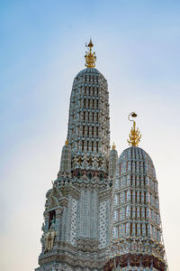 Low angle view of statue of building against sky