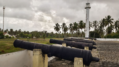 Built structure on field against sky