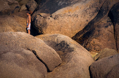 Close-up of rock and child