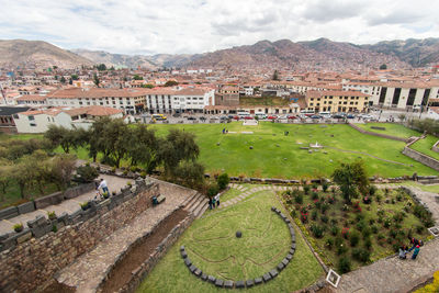 High angle view of townscape against cloudy sky