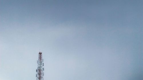 Low angle view of vapor trail against clear sky