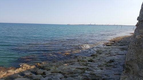 Scenic view of sea against clear sky