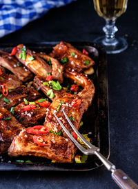 Close-up of meat on barbecue grill