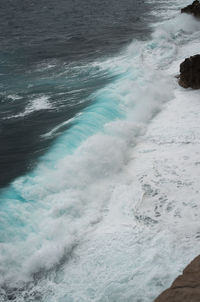 Sea waves splashing on beach