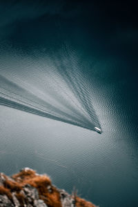 Top down view on lake with a boat