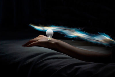 View of bulb on human hand