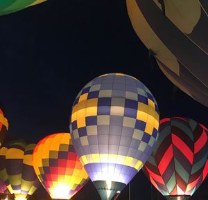 Low angle view of hot air balloon against sky at night