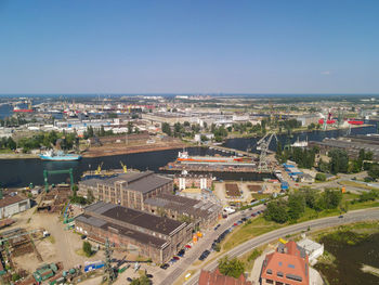 High angle view of buildings against clear sky