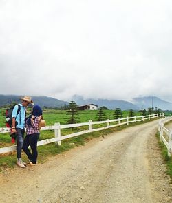 Man walking on road