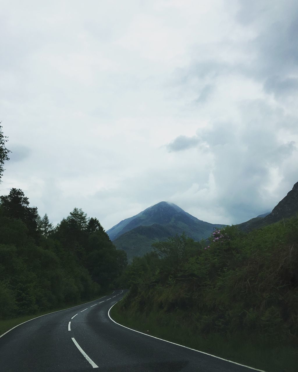 MOUNTAIN ROAD AGAINST SKY