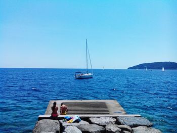 Boat sailing in sea