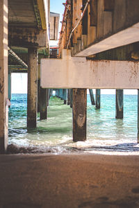 Pier over sea against sky