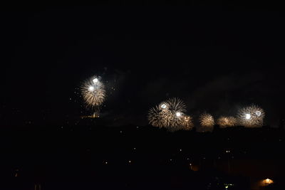 Firework display at night