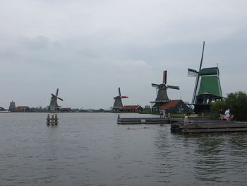 Traditional windmill against sky