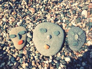 High angle view of pebbles on beach