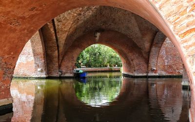 Arch bridge over river