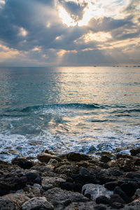 Scenic view of sea against sky during sunset