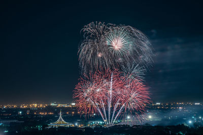 Firework display at night